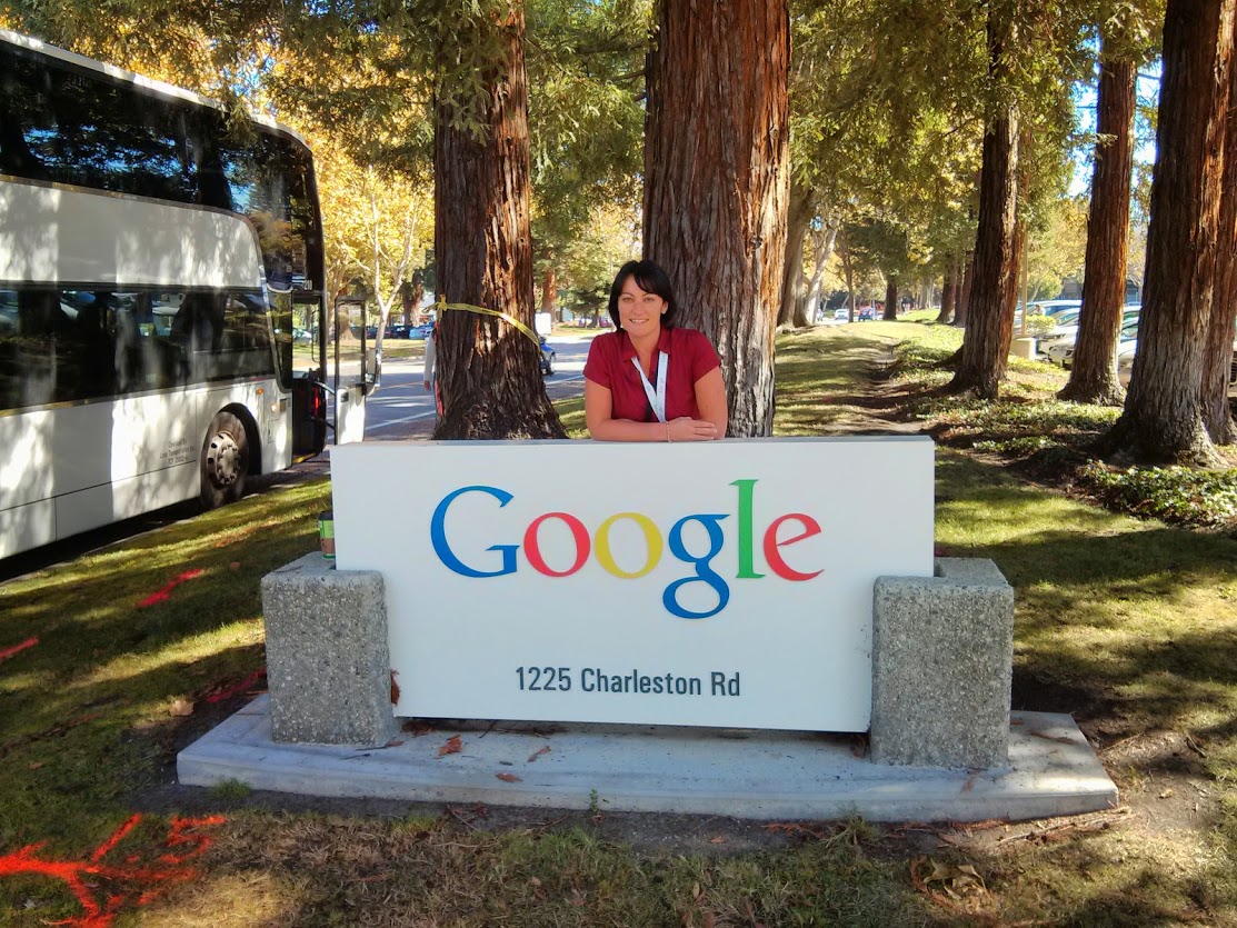 Karine Kugler visiting the Google headquarters sign at 1225 Charleston Road in Mountain View, California